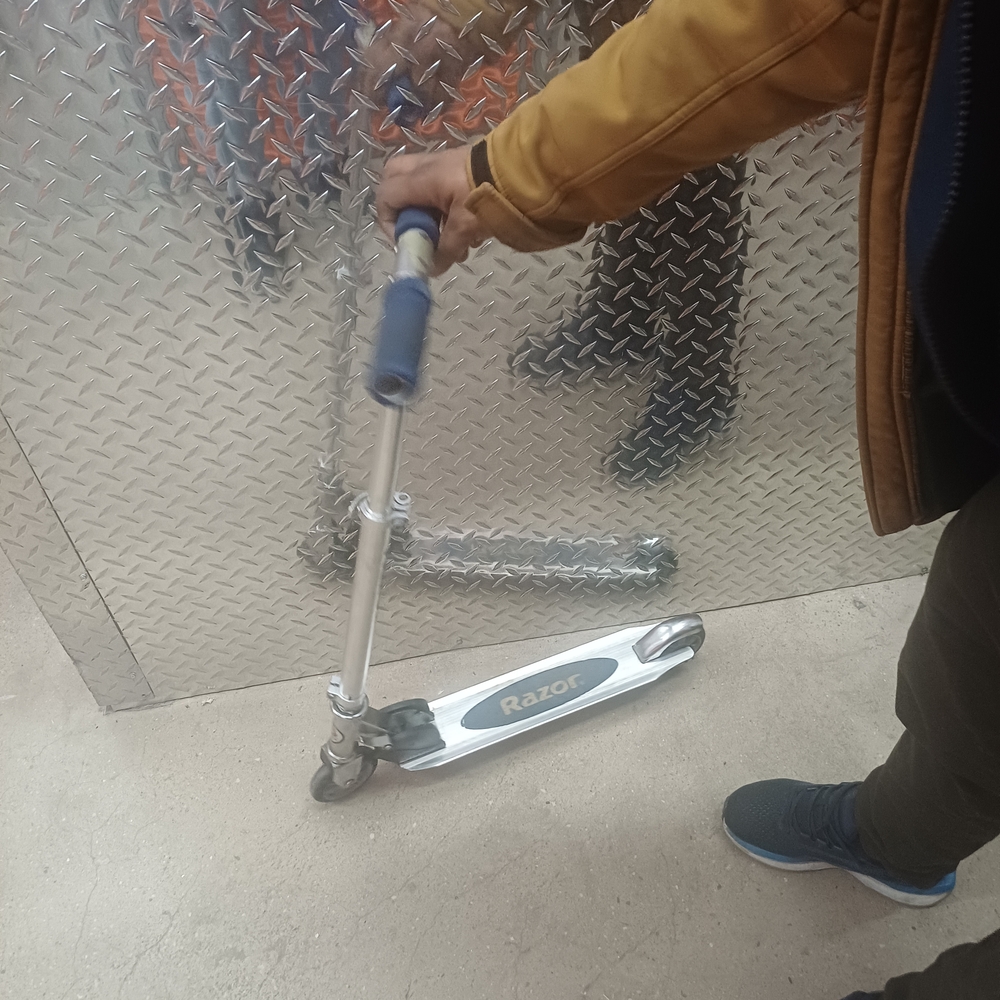 Razor Silver Scooter with Blue Handles